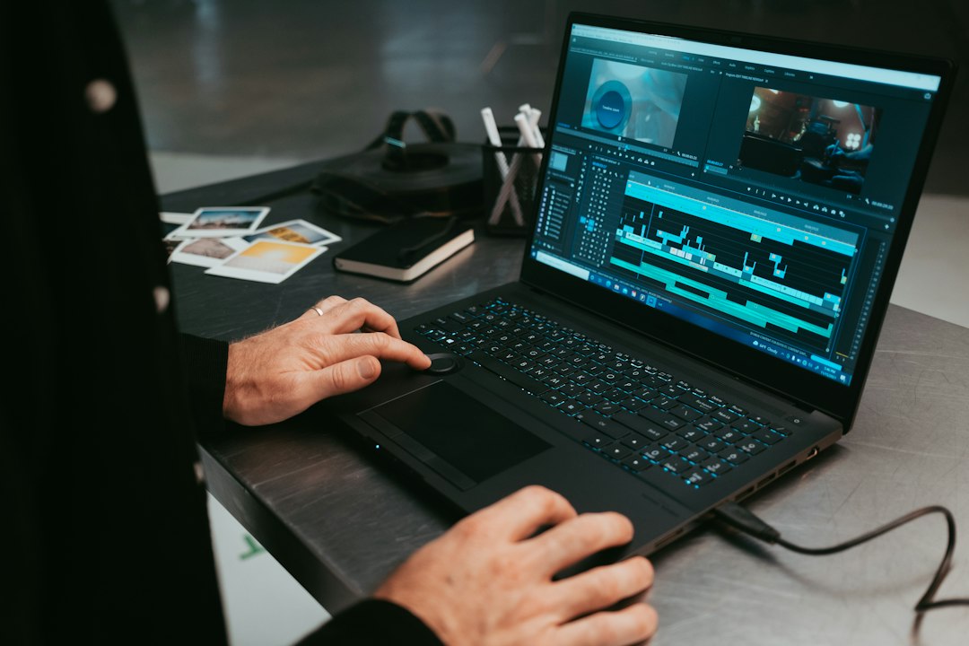 Creator using a laptop while fixing CapCut auto captions